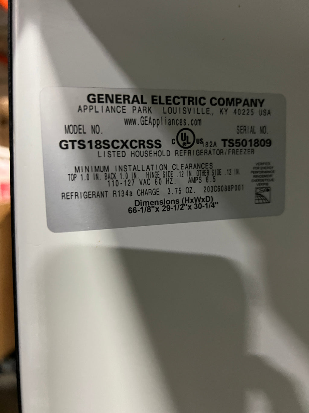 Used GE Refrigerator/Freezer (Black/Silver)