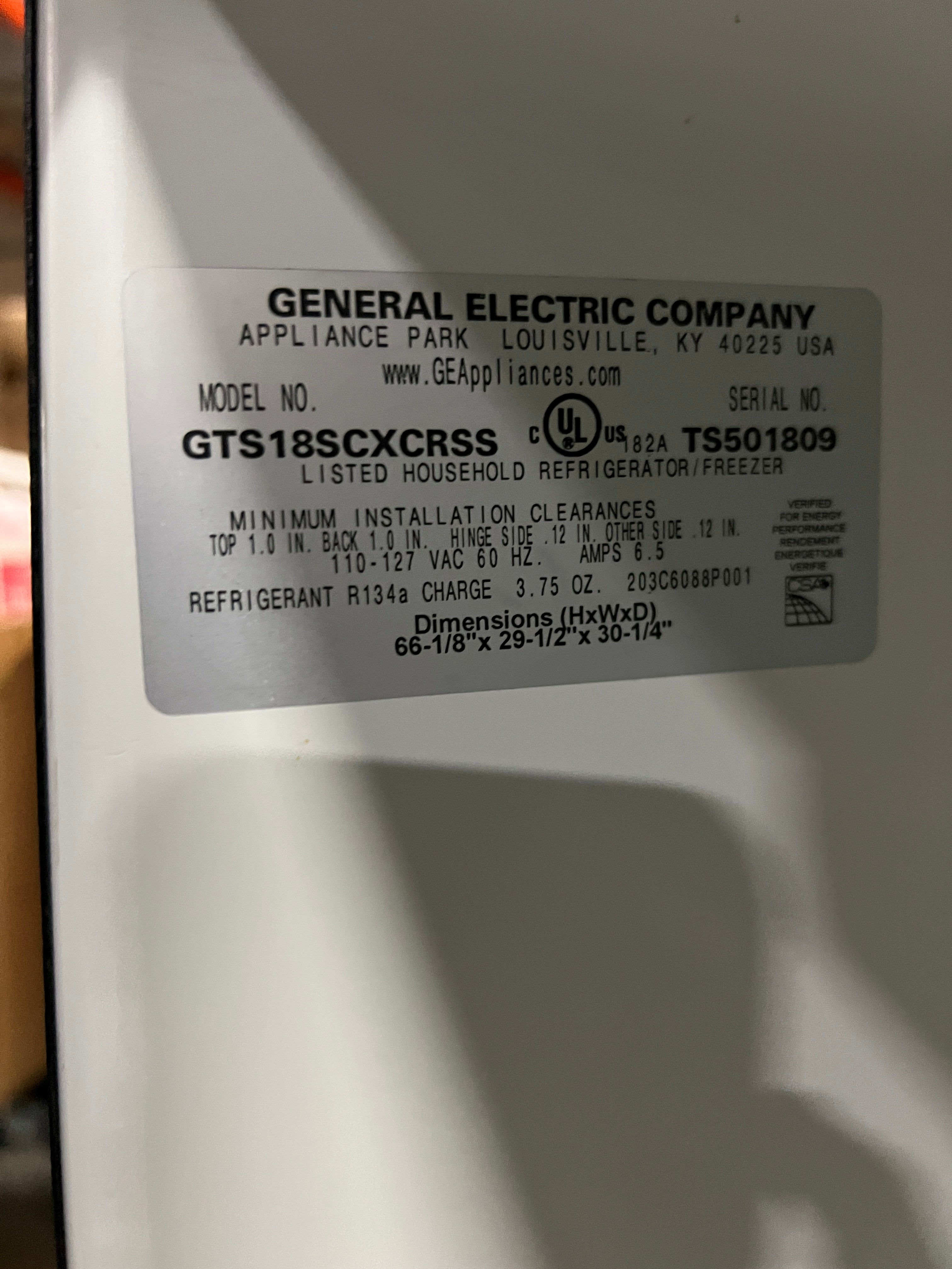 Used GE Refrigerator/Freezer (Black/Silver)