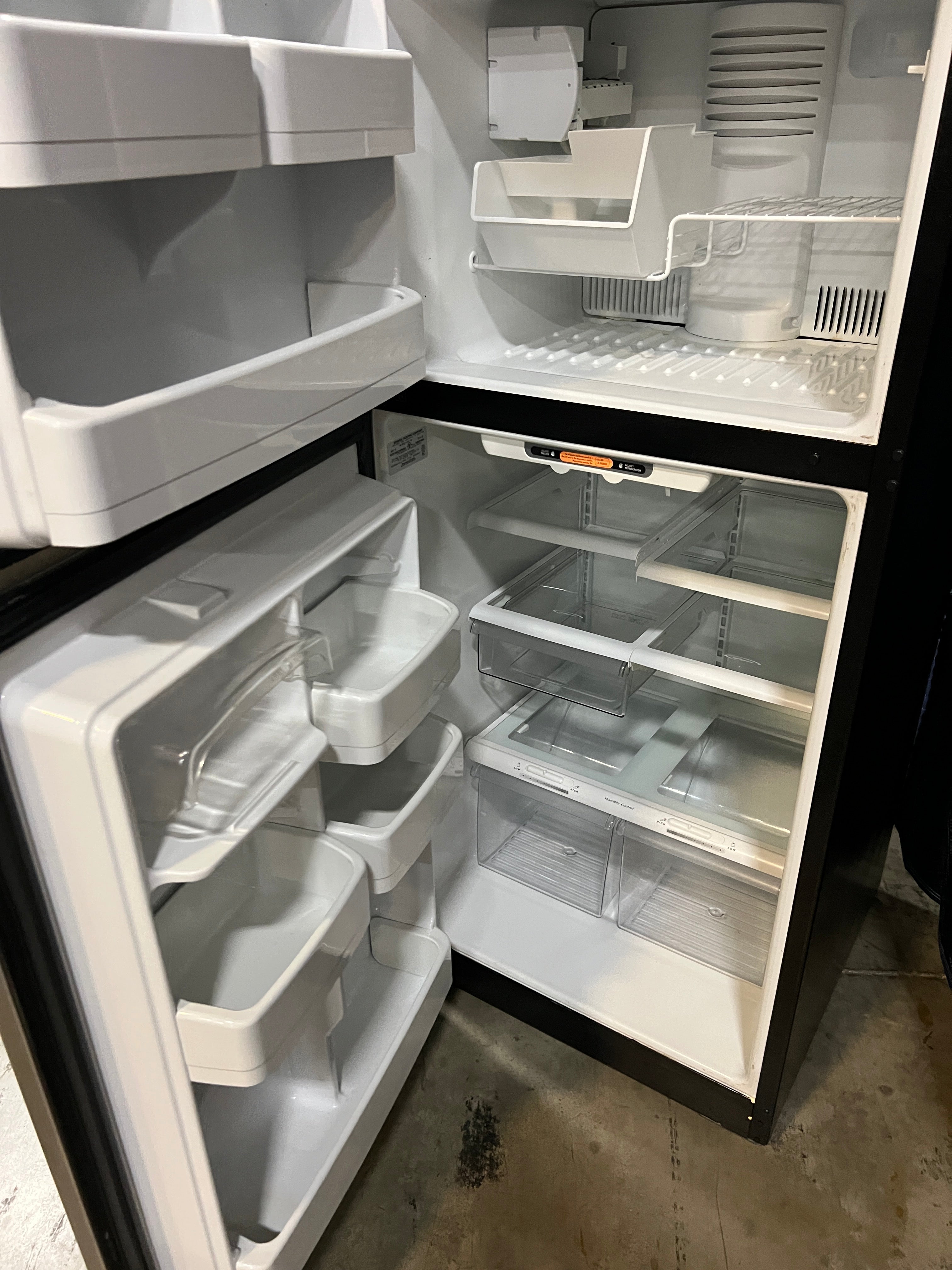 Used GE Refrigerator/Freezer (Black/Silver)